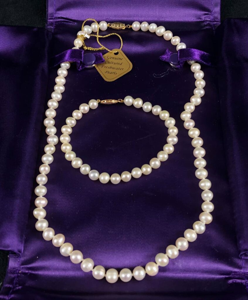 Vintage pearl set in purple satin box